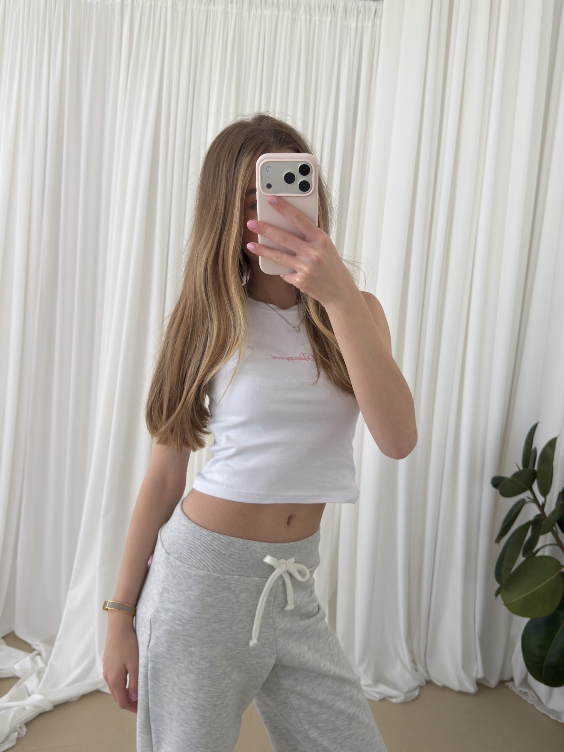 Top mila