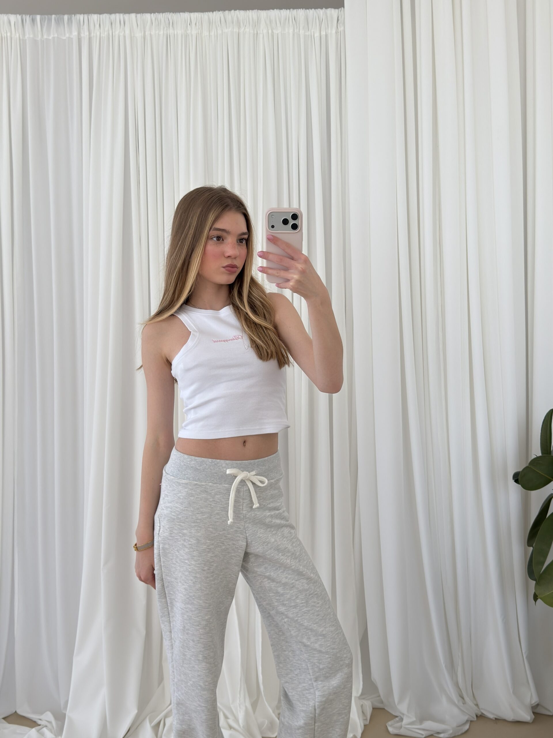Top mila